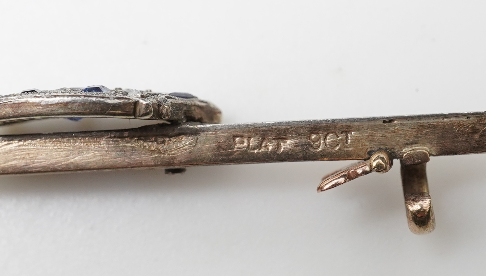 A bar brooch and a stick pin, late 19th/early 20th century